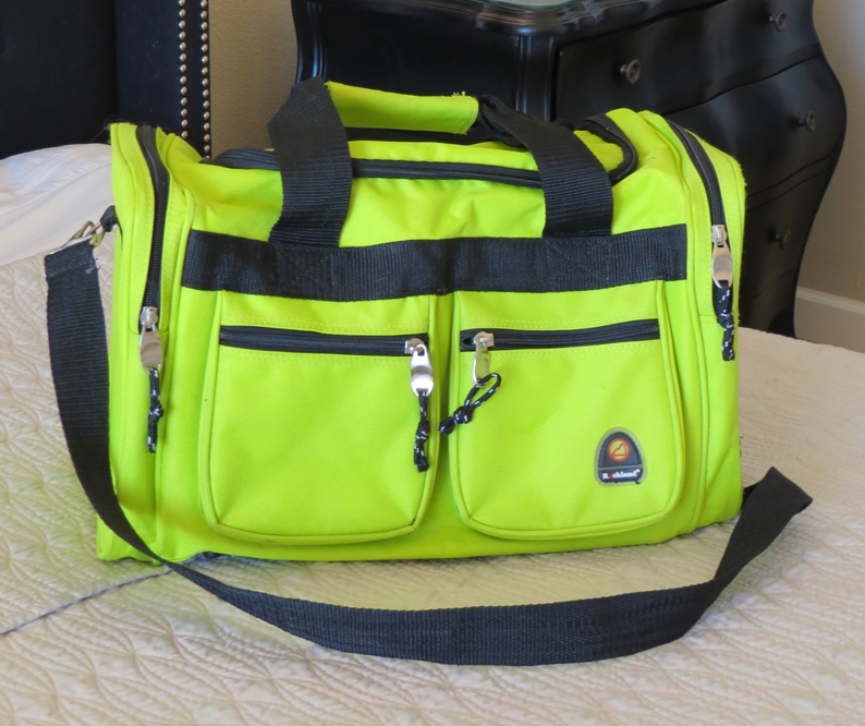 chartreuse duffel bag with zippers, snowbird blog, Midlife Snowbird, The Emerald Coast, FL