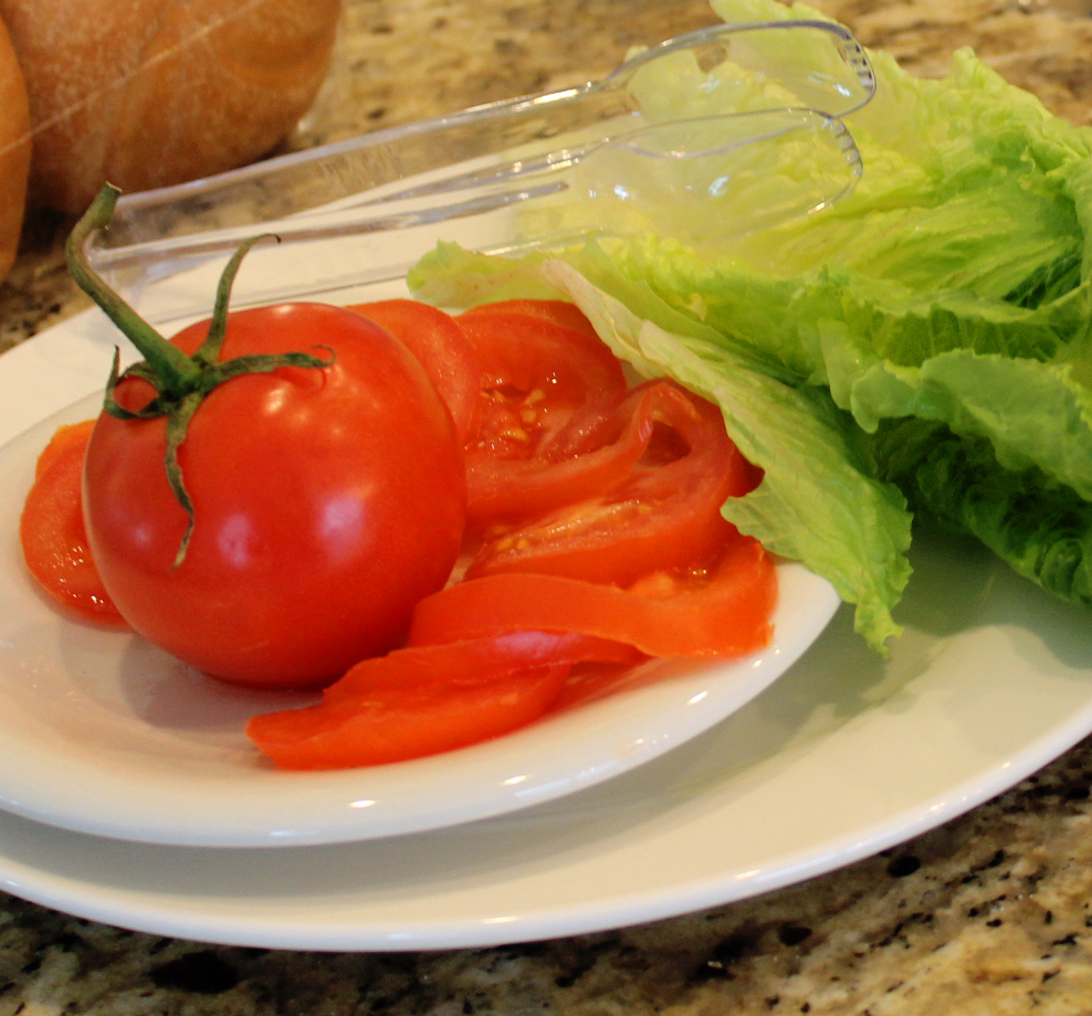 sliced vine ripened tomatoes, romaine lettuce Snowbird Burgers