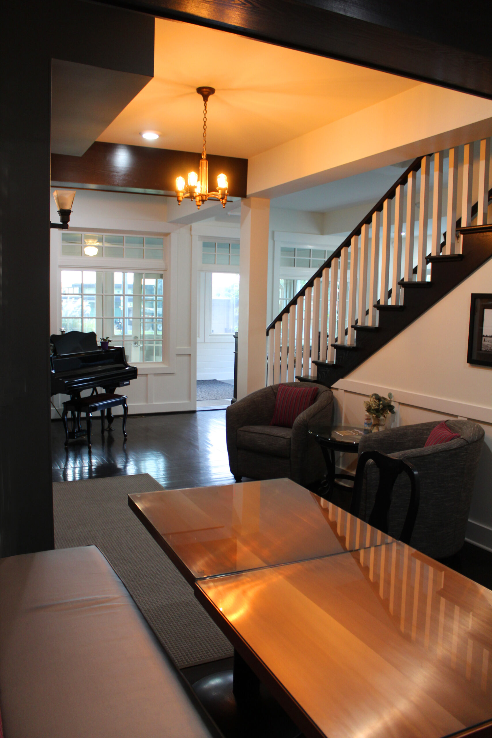 The Hotel Saugatuck's lobby features original stairs and floors