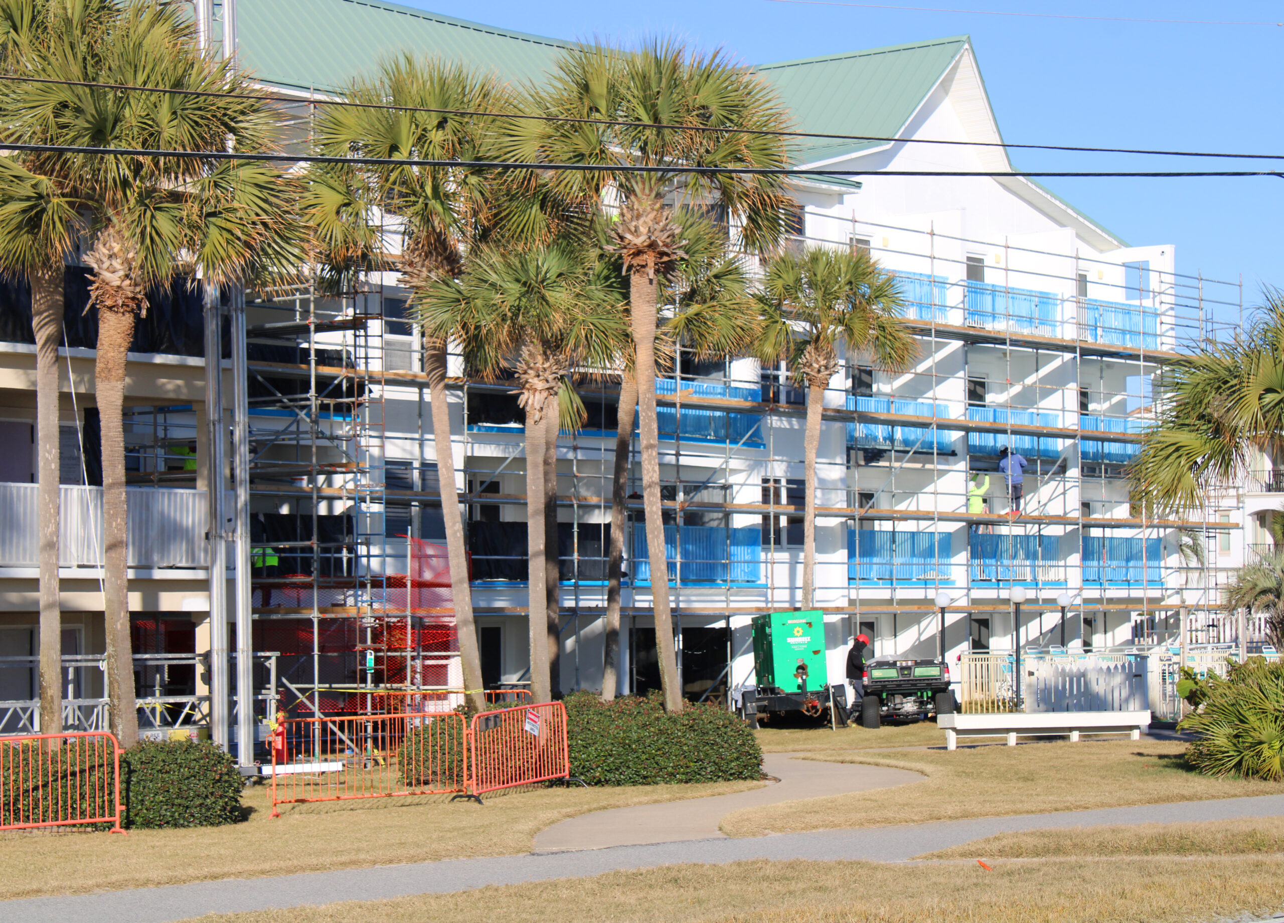 construction scaffolding on front of condo complex